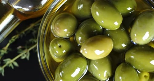 Green Olives in Oil Close Up