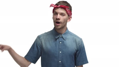 Man with Bandana Makes OK Sign and Smiles