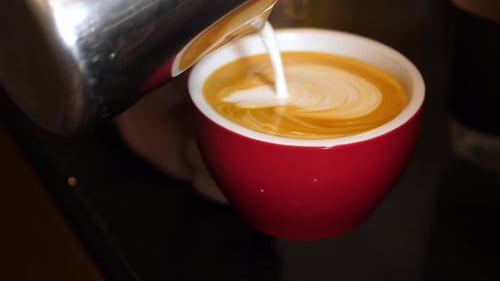 Barista Making Of Cafe Latte Art