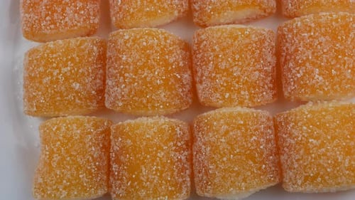 Sugary jelly coated with sugar. colorful sweet.