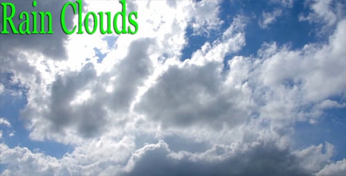 White Clouds Drifting Across Brilliant Blue Sky