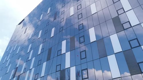 Corporate building Real Estate ,Office buildings with glass reflections of the sky