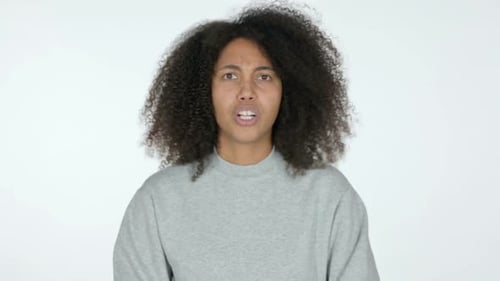 African Woman Arms Crossed No Sign White Background