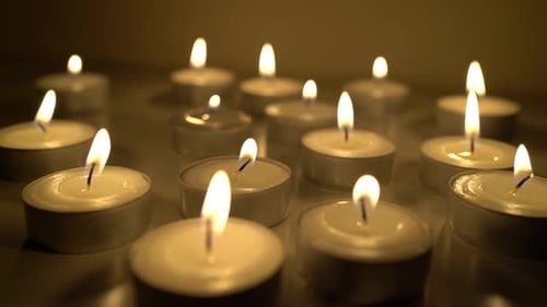 Many Tea Candles Warmly Burning