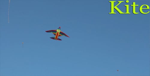 Colorful Airplane Kite Drifting Gently in a Blue Sky