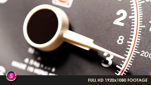 Close Up of an Analog Meter Measuring Progress