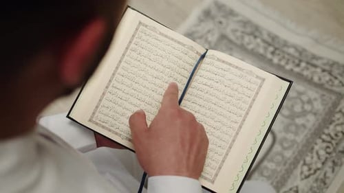 Man Praying Reading Koran Closeup Islamic Religion
