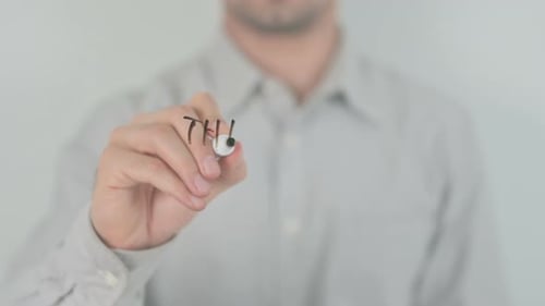 Hand Writes Think for Change on Glass Surface