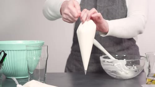Step by step. Mixing in food coloring into the royal icing to decorate sugar cookies.