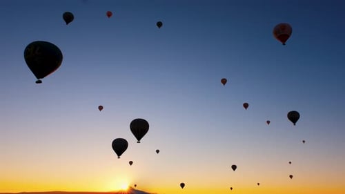 Sunrise Hot Air Balloons Flight Over Horizon