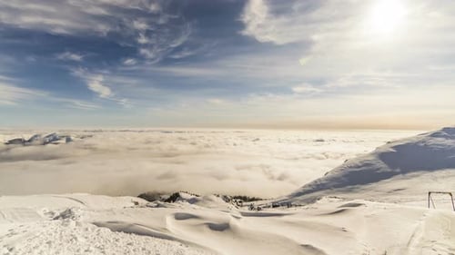 Snowy Mountain Landscape Above Cloud Level