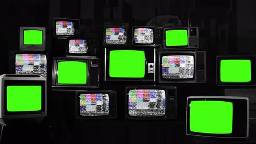 Seven Old TVs with Green Screen among Many Broken TV Sets. BW Tone. 4K Version.