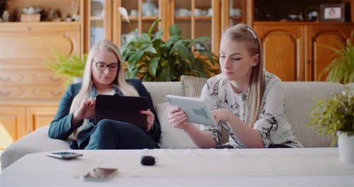 Businesswomen Discussing Over Technologies In Office, Businesswomen Working on Digital Tablet