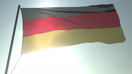 German Flag Waving in Wind with Bright Sunlight
