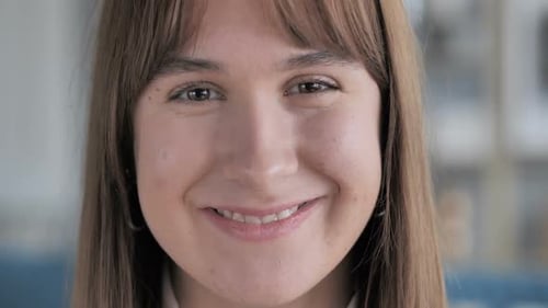 Close Up of Smiling Casual Young Girl Face