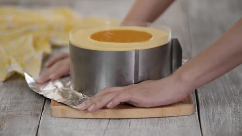 Preparing Elegant Layered Cake With Metal Frame