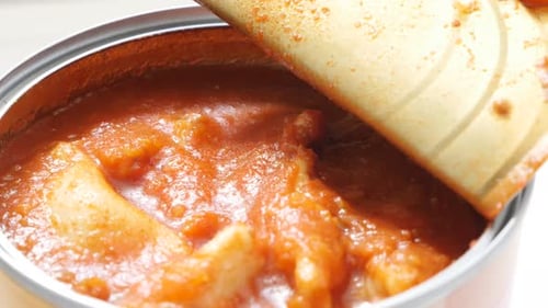 Opened ravioli canned food ready to eat meal close-up 4K 2160p 30fps UltraHD footage - Can opener s