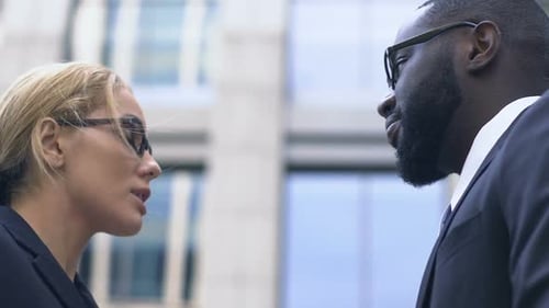 Male and Female Office Workers Disputing Outdoors, Business Ethics, Rivalry