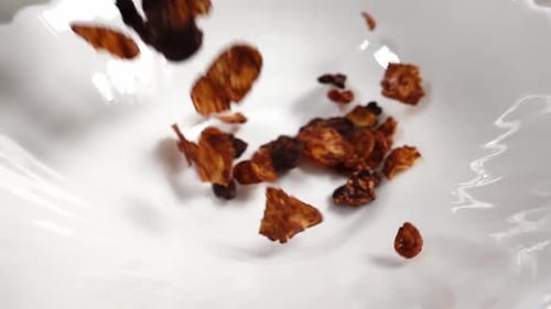 Chocolate Frosted Corn Flakes Poured Into a Bowl