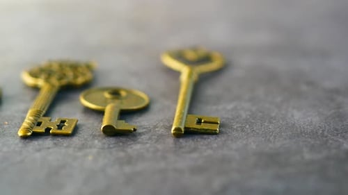 Many Old Keys on Table Close Up