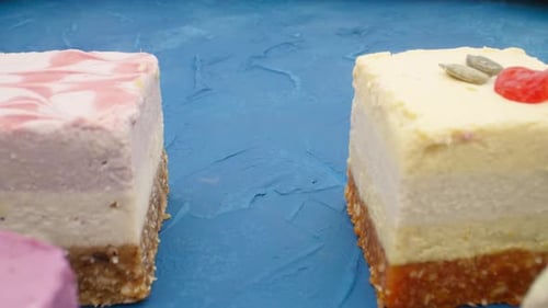 Delicious Cheesecakes Pastries on a Blue Background