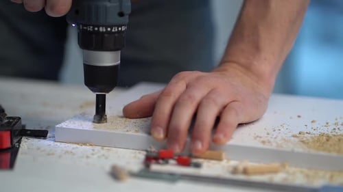 Drilling Hole in White Board with Power Drill