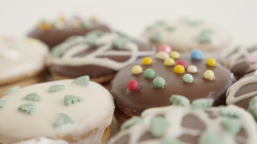 Shallow DOF cookies with sprinkles 4K 2160p 30fps UltraHD footage - Mixed teacakes stuffed with mar