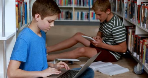 Attentive students studying in library