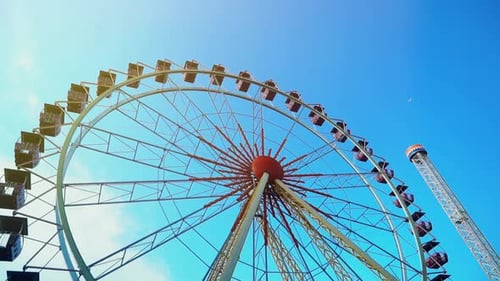 Ferris Wheel on Clear Day at Amusement Park