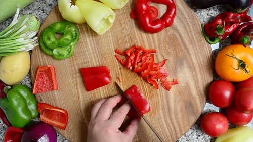 The Cook Cuts Pepper