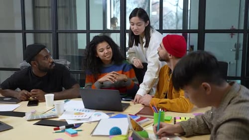 Team Discussing a Project at Office Workplace