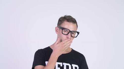 Studio Shot of Nerd Man Blowing Kiss