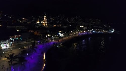 Coastal Cityscape at Night Aerial View