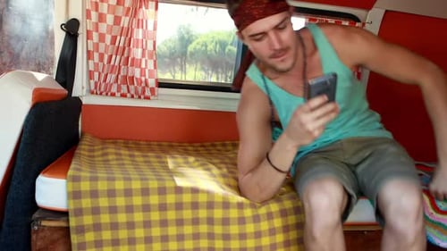 Man Relaxes and Drives Camper Van in Nature