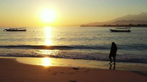 One woman suntans on tropical lagoon beach adventure by shallow water with white sand background of
