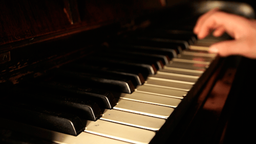 Close Up of Piano Keys Being Played