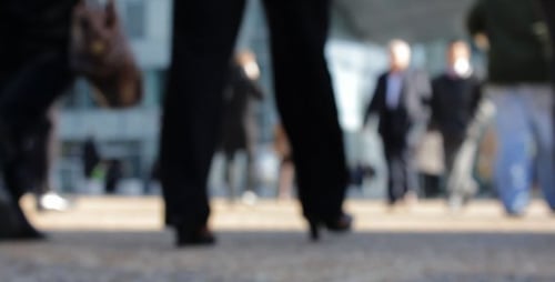 People in a Busy City Center (Out of Focus)