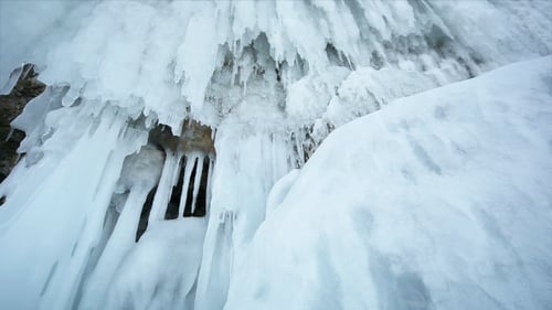 Motion Along an Ice Wall