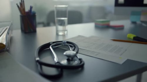 Closeup Modern Doctor Desktop in Clinic