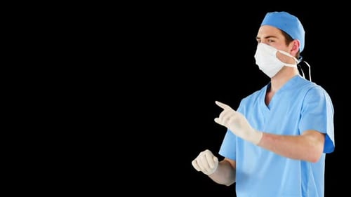 Surgeon pretending to be using futuristic digital screen