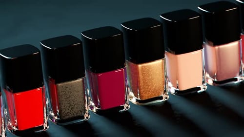 Animated Row of Shimmering Nail Polish Bottles