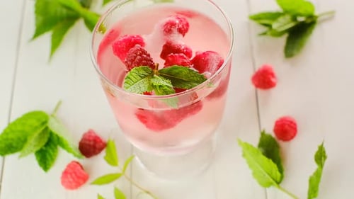 Refreshing Raspberry and Mint Drink with Ice