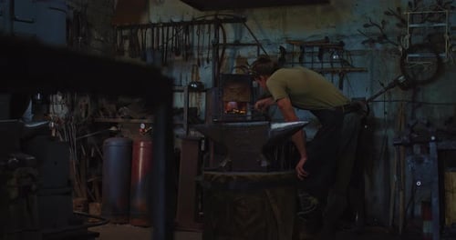Handsome Blacksmith is Working in His Forge Studio Ancient Craft and Hobby Prores