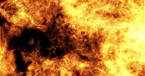 Wall of Fire loop. flames and embers burning fuel in high heat.