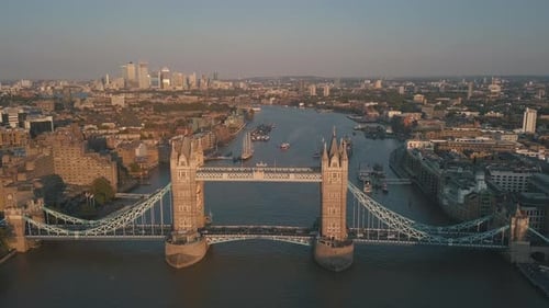 Tower Bridge over Thames River in London at Sunset or Sunrise, Aerial Crane lowering Establishing Wi