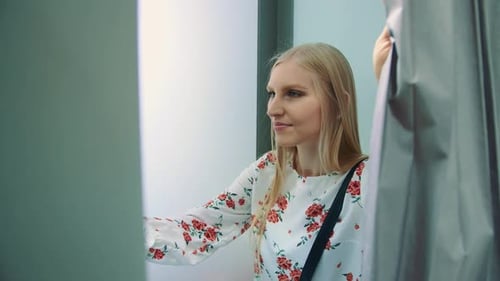 Medium Shot Young Women Posing in Photo Booth