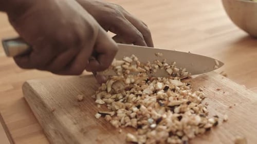 Dicing An Eggplant on Cutting Board Close Up