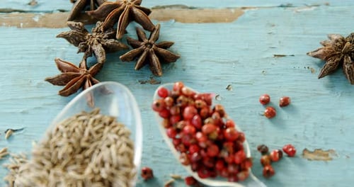 Star Anise and Spices on Blue Wooden Surface