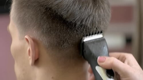 Person getting Haircut with Hair Trimmer