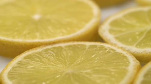 Lemon Slices Closeup, Macro Food Summer Background, Fruits Top View. Rotate